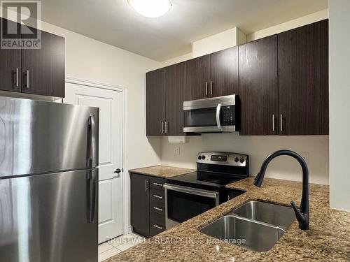 108 - 7768 Kennedy Road, Markham, ON - Indoor Photo Showing Kitchen With Stainless Steel Kitchen With Double Sink With Upgraded Kitchen