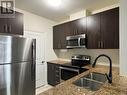 108 - 7768 Kennedy Road, Markham, ON  - Indoor Photo Showing Kitchen With Stainless Steel Kitchen With Double Sink With Upgraded Kitchen 