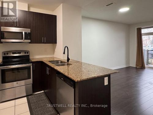 108 - 7768 Kennedy Road, Markham, ON - Indoor Photo Showing Kitchen With Stainless Steel Kitchen With Double Sink