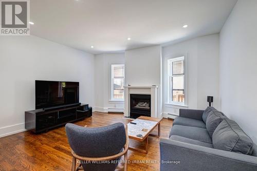 42 High Park Boulevard, Toronto, ON - Indoor Photo Showing Living Room With Fireplace