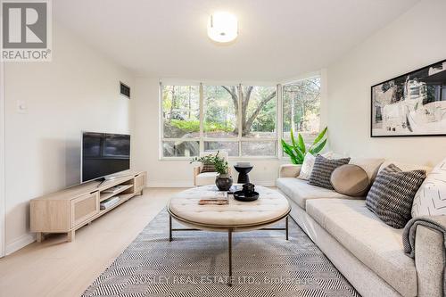 115 - 1200 Don Mills Road, Toronto, ON - Indoor Photo Showing Living Room