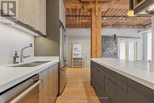 109 - 993 Queen Street W, Toronto, ON - Indoor Photo Showing Kitchen With Double Sink