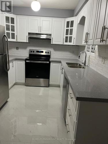 27 Lonestar Crescent, Brampton, ON - Indoor Photo Showing Kitchen With Double Sink