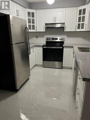 27 Lonestar Crescent, Brampton, ON - Indoor Photo Showing Kitchen With Double Sink