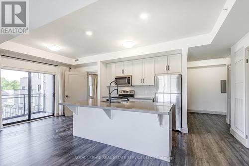 212 - 30 Hamilton Street S, Hamilton, ON - Indoor Photo Showing Kitchen With Double Sink