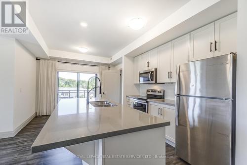 212 - 30 Hamilton Street S, Hamilton, ON - Indoor Photo Showing Kitchen With Stainless Steel Kitchen With Double Sink