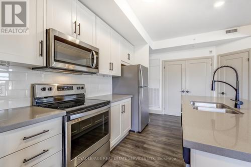 212 - 30 Hamilton Street S, Hamilton, ON - Indoor Photo Showing Kitchen With Stainless Steel Kitchen With Double Sink With Upgraded Kitchen