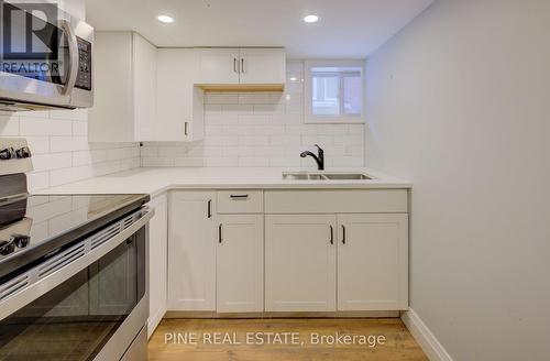 Lower - 21 Fairview Avenue, Kitchener, ON - Indoor Photo Showing Kitchen With Double Sink