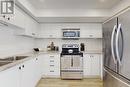 63 - 2441 Greenwich Drive, Oakville, ON  - Indoor Photo Showing Kitchen With Stainless Steel Kitchen With Double Sink 