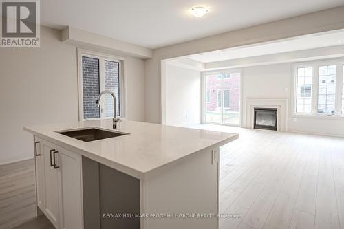 11 Amsterdam Drive, Barrie, ON - Indoor Photo Showing Kitchen With Fireplace