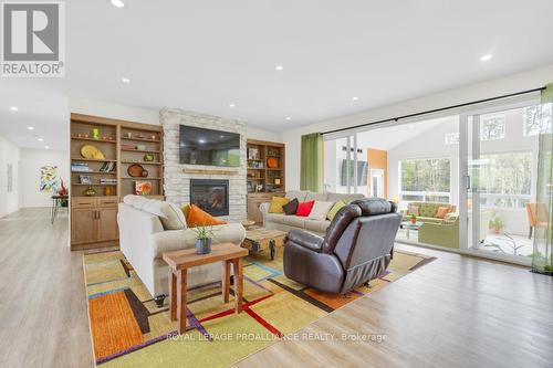 86 Sunrise Drive, Prince Edward County (Ameliasburgh), ON - Indoor Photo Showing Living Room With Fireplace