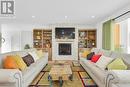 86 Sunrise Drive, Prince Edward County (Ameliasburgh), ON  - Indoor Photo Showing Living Room With Fireplace 