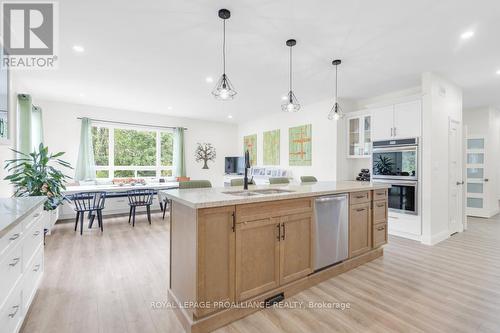 86 Sunrise Drive, Prince Edward County (Ameliasburgh), ON - Indoor Photo Showing Kitchen With Double Sink