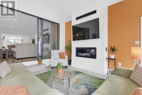 86 Sunrise Drive, Prince Edward County (Ameliasburgh), ON - Indoor Photo Showing Living Room With Fireplace