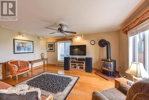 2102 Lakeshore Drive, Ramara, ON - Indoor Photo Showing Living Room With Fireplace