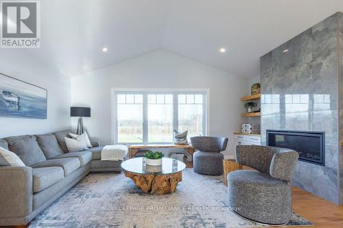 1647 Lakeside Drive, Prince Edward County (Ameliasburgh), ON - Indoor Photo Showing Living Room With Fireplace