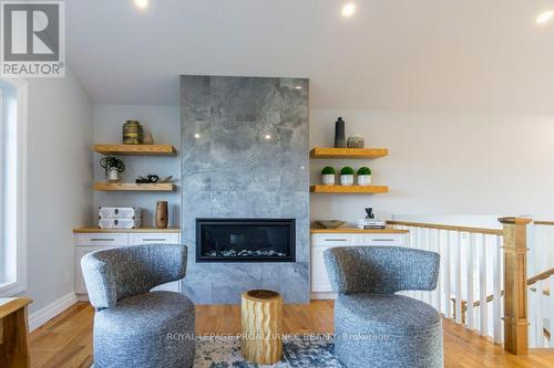 1647 Lakeside Drive, Prince Edward County (Ameliasburgh), ON - Indoor Photo Showing Living Room With Fireplace