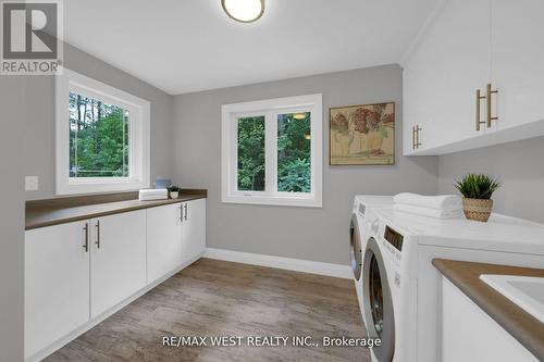 7 Loftus Road, Springwater, ON - Indoor Photo Showing Laundry Room