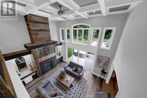 7 Loftus Road, Springwater, ON - Indoor Photo Showing Other Room With Fireplace