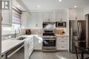 106 - 2301 Cavendish Drive, Burlington, ON  - Indoor Photo Showing Kitchen With Stainless Steel Kitchen With Upgraded Kitchen 