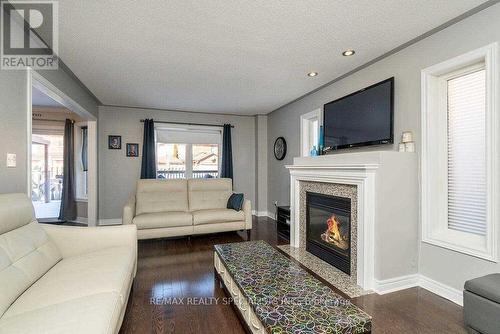 10 Forsyth Crescent, Halton Hills, ON - Indoor Photo Showing Living Room With Fireplace