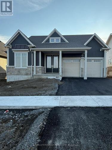 162 Country Club Drive, Loyalist, ON - Outdoor With Facade