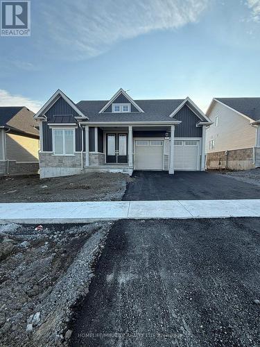 162 Country Club Drive, Loyalist, ON - Outdoor With Facade