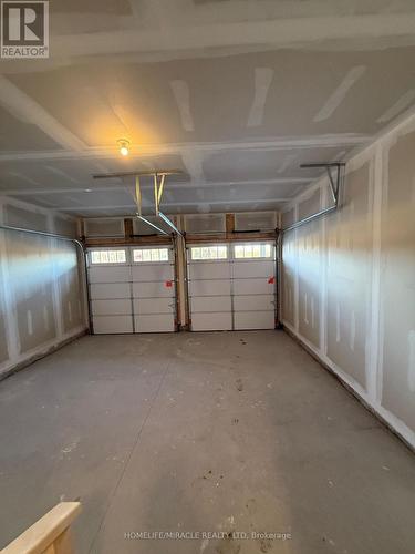 162 Country Club Drive, Loyalist, ON - Indoor Photo Showing Garage