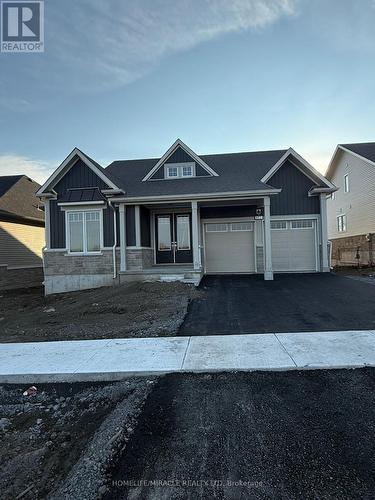 162 Country Club Drive, Loyalist, ON - Outdoor With Facade