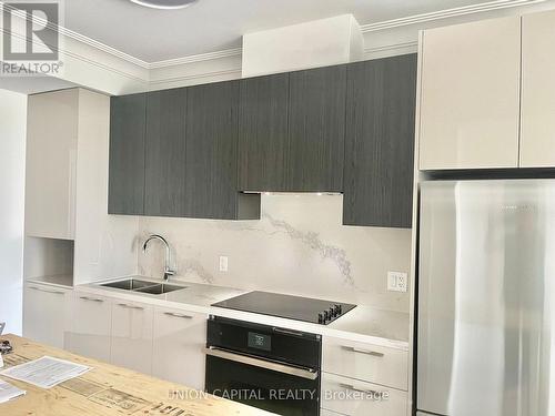 701 - 8 Water Walk Drive, Markham, ON - Indoor Photo Showing Kitchen With Double Sink With Upgraded Kitchen