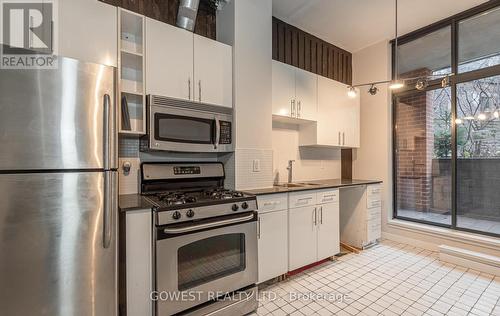 201 - 369 Sorauren Avenue, Toronto, ON - Indoor Photo Showing Kitchen With Stainless Steel Kitchen