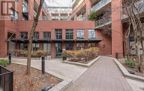 201 - 369 Sorauren Avenue, Toronto, ON - Outdoor With Balcony With Facade