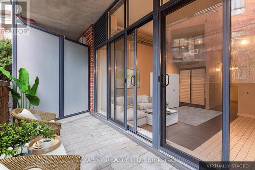 201 - 369 Sorauren Avenue, Toronto, ON - Outdoor With Balcony With Exterior