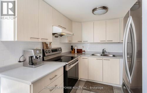 409 - 25 Agnes Street, Mississauga, ON - Indoor Photo Showing Kitchen With Stainless Steel Kitchen With Double Sink