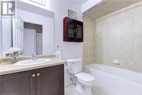 Full bathroom with toilet, vanity, shower / bathtub combination, and tile patterned floors - 151 Green Road S Unit# 26, Stoney Creek, ON - Indoor Photo Showing Bathroom