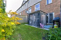 View of yard with a sunroom - 