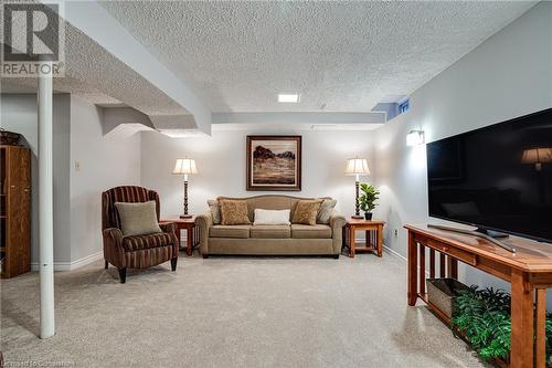 Lower levell family room - 2301 Cavendish Drive Unit# 106, Burlington, ON - Indoor Photo Showing Living Room