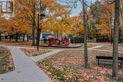 View of community park with a playground - 2301 Cavendish Drive Unit# 106, Burlington, ON - Outdoor