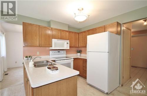 11 Tanner Crescent, Kanata, ON - Indoor Photo Showing Kitchen With Double Sink