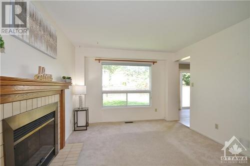 11 Tanner Crescent, Kanata, ON - Indoor With Fireplace