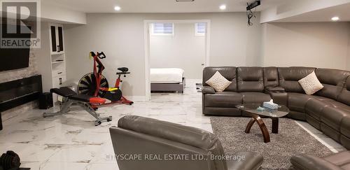 64 Burlwood Road, Brampton, ON - Indoor Photo Showing Basement With Fireplace