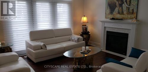 64 Burlwood Road, Brampton, ON - Indoor Photo Showing Living Room With Fireplace