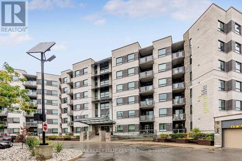 315 - 383 Main Street E, Milton, ON - Outdoor With Balcony With Facade