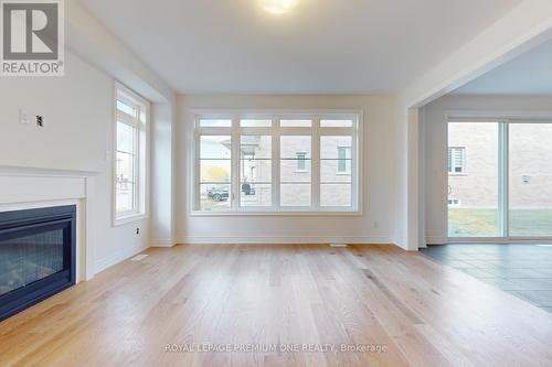 9 Ann Mckee Street, Caledon, ON - Indoor Photo Showing Living Room With Fireplace