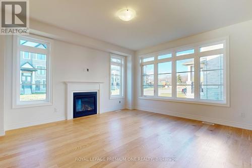 9 Ann Mckee Street, Caledon, ON - Indoor Photo Showing Living Room With Fireplace