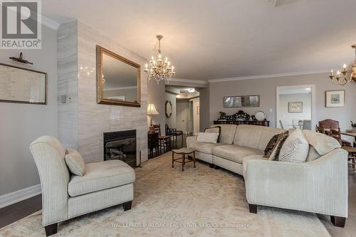 311 - 430 Pearl Street, Burlington, ON - Indoor Photo Showing Living Room With Fireplace