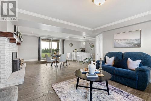 1029 Eldon Road, Kawartha Lakes (Oakwood), ON - Indoor Photo Showing Living Room With Fireplace