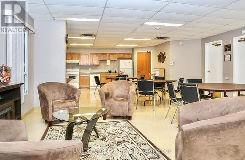 307 - 325 Village Grove, Tecumseh, ON - Indoor Photo Showing Living Room