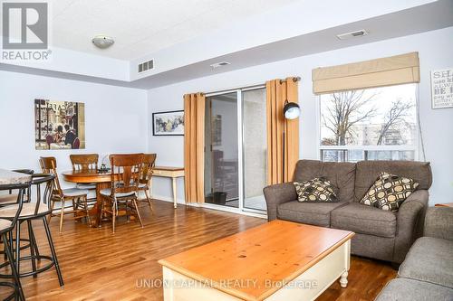 307 - 325 Village Grove, Tecumseh, ON - Indoor Photo Showing Living Room