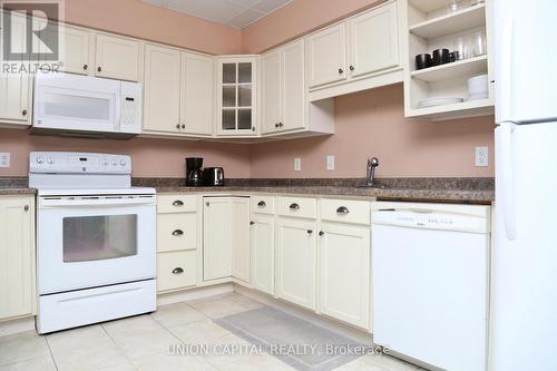 307 - 325 Village Grove, Tecumseh, ON - Indoor Photo Showing Kitchen